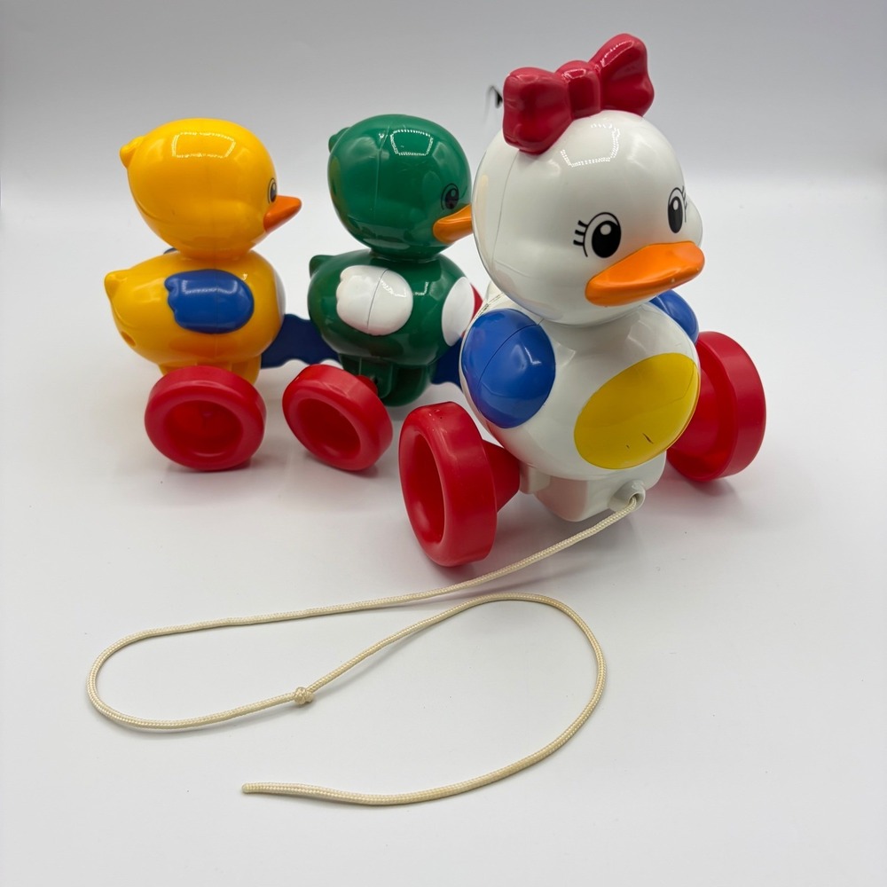 Vintage 1995 Tomy Duck Pull Toy Trio White Green Yellow Red Wheels Toddler Toy